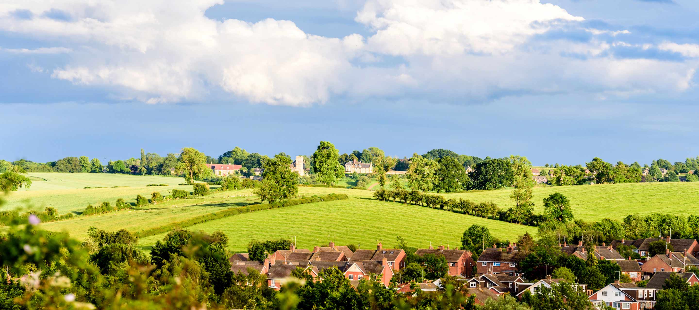 New homes in front of sceneic fields